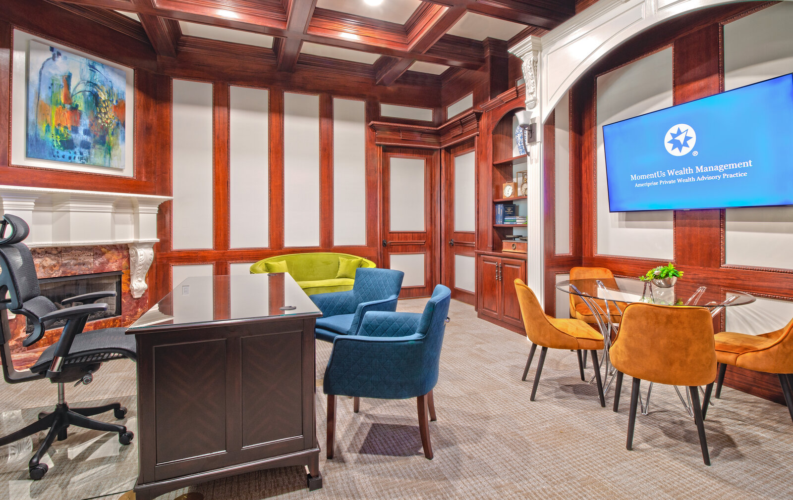 Wood-paneled private office designed by Landry Designs for a Colleyville client's MomentUs Wealth Management practice